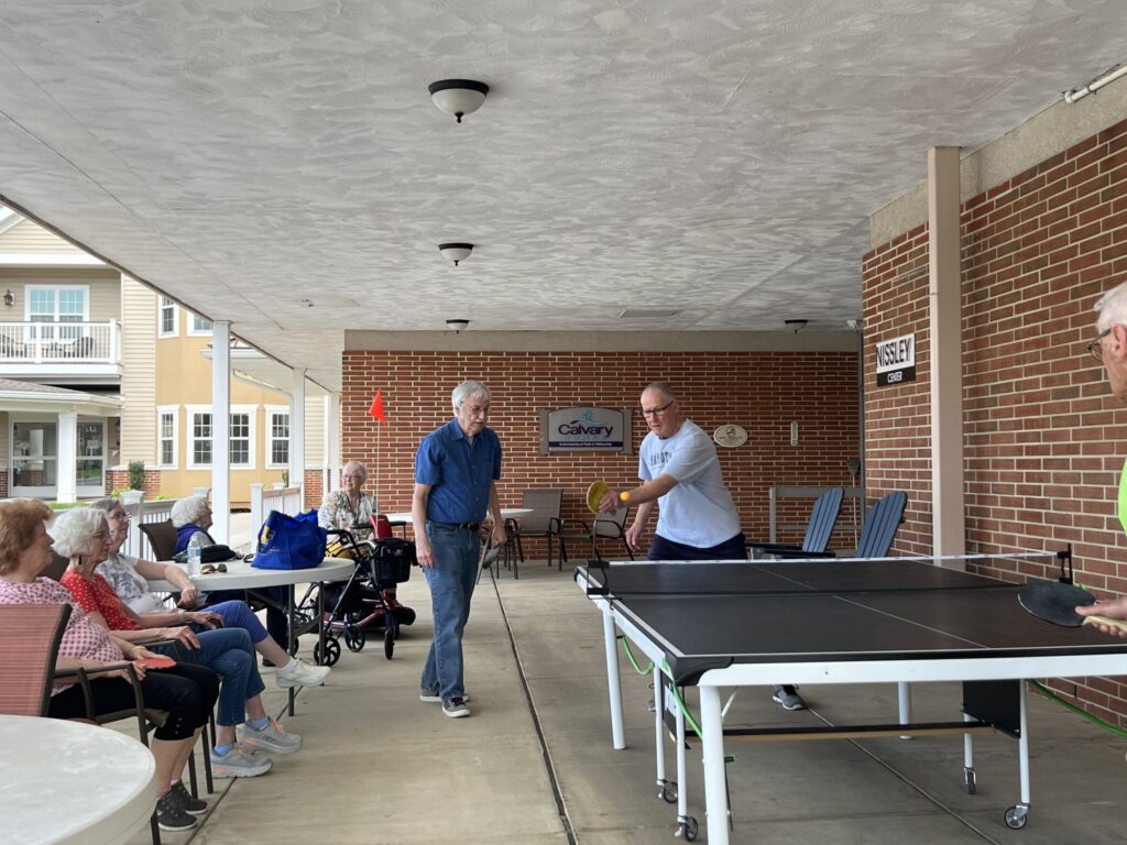 Seniors playing table tennis